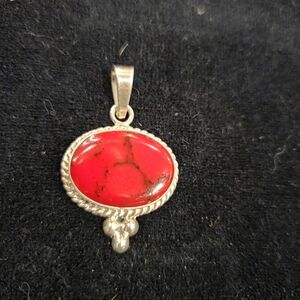 Elegant Sterling Silver and Red Pendant